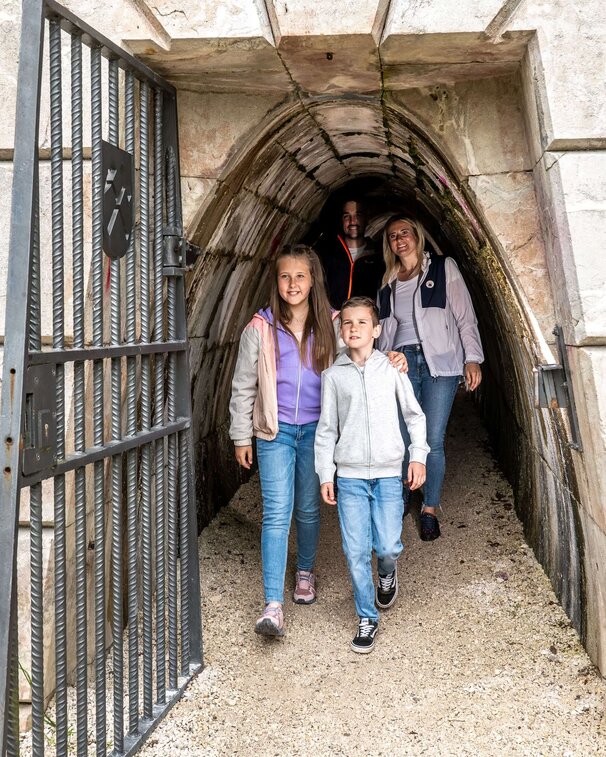 Family in the Moserr?sche tunnel on the Salt Experience Trail