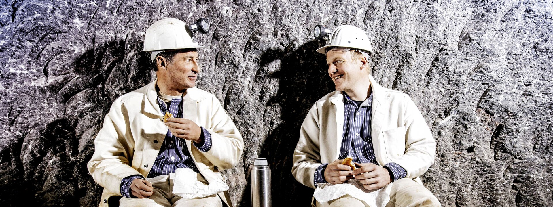 Miners having a snack underground